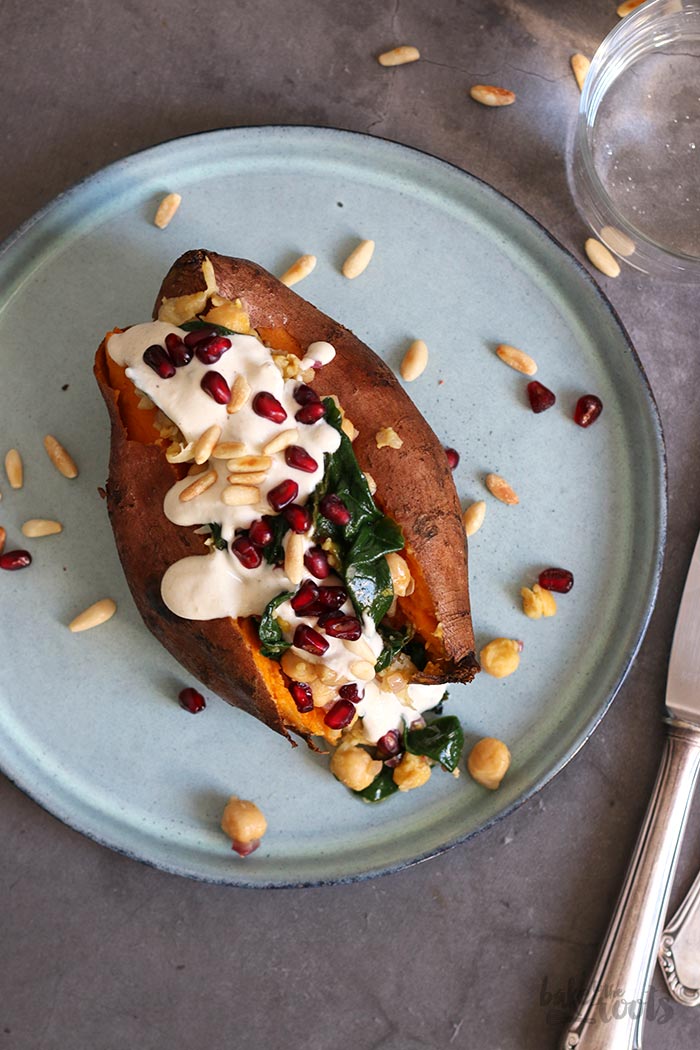 Sweet Potato with Chickpeas, Spinach and Tahini Sauce | Bake to the roots