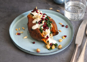Sweet Potato with Chickpeas, Spinach and Tahini Sauce | Bake to the roots