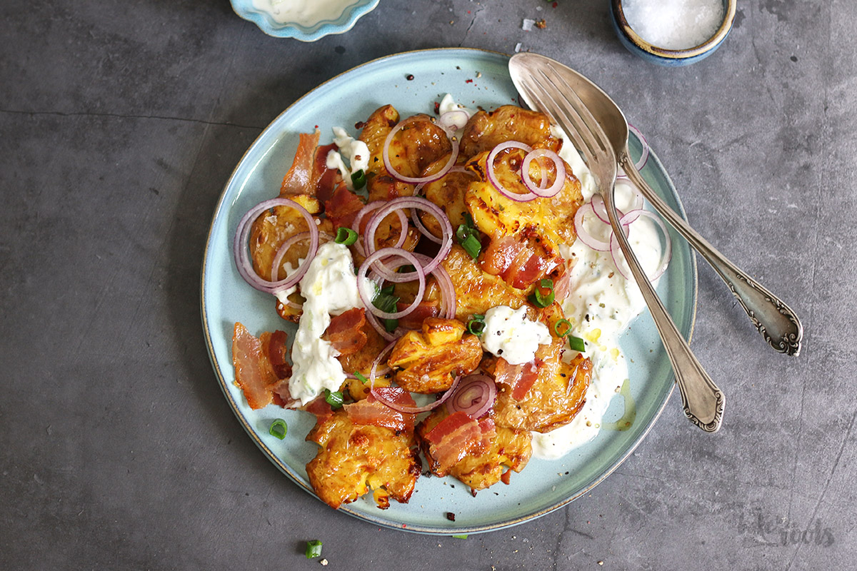 Crispy Smashed Potato Salad with Bacon and Tzatziki | Bake to the roots