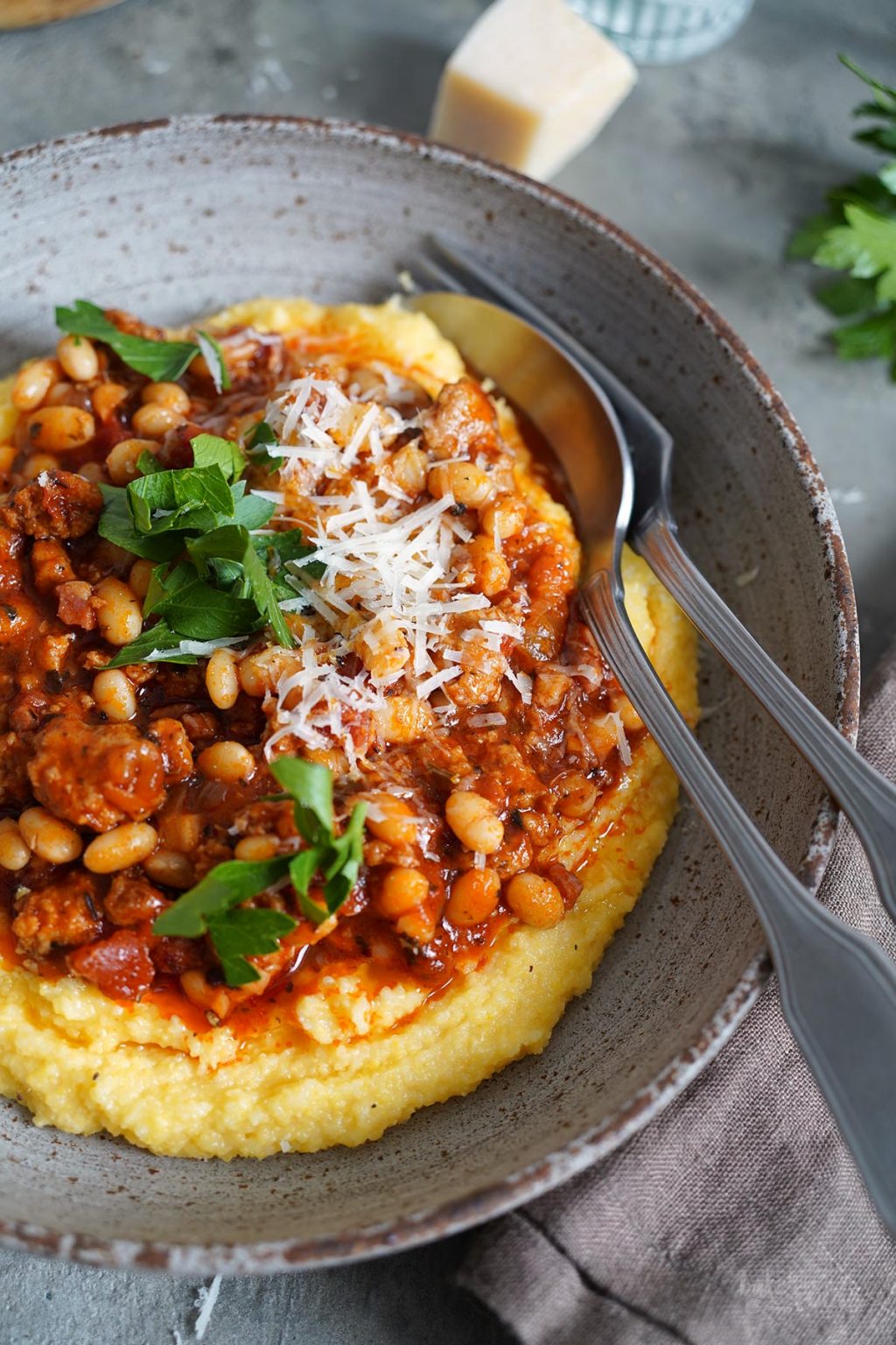 Sausage & Bacon Ragù with White Beans and Polenta BTTR