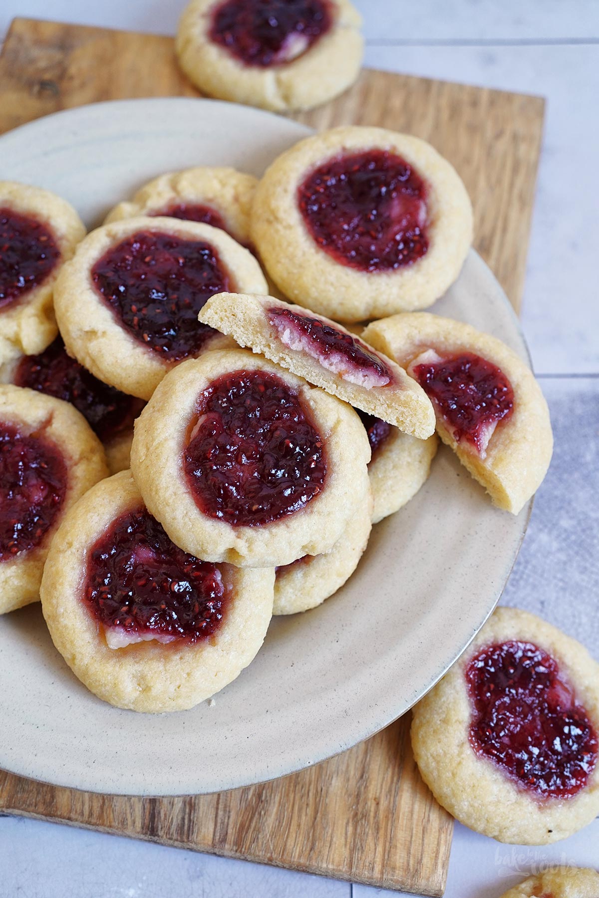 Raspberry Cheesecake Thumbprint Cookies | Bake to the roots