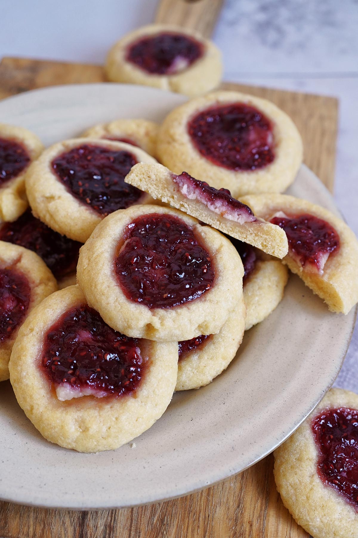Raspberry Cheesecake Thumbprint Cookies | Bake to the roots